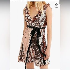 Selling sequin gold and purple free people dress